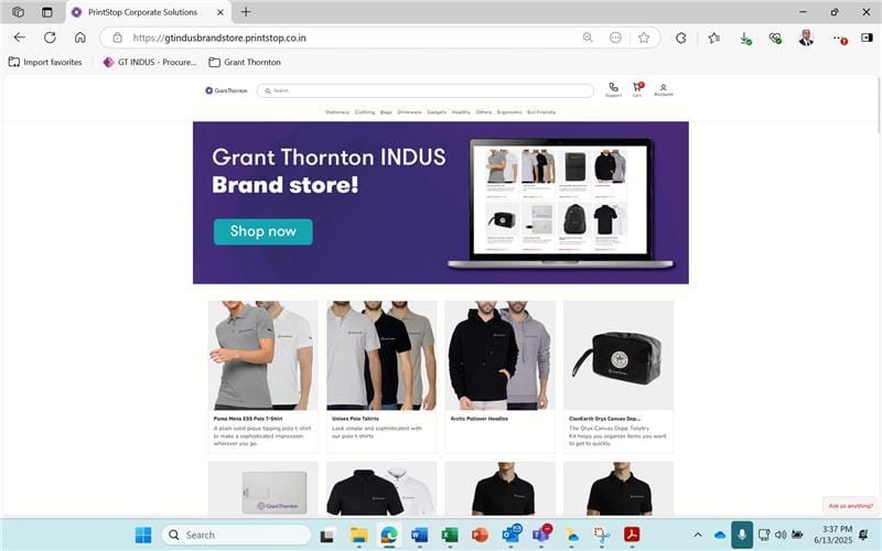 Screenshot of the Grant Thornton INDUS brand store homepage showcasing branded merchandise like polos, hoodies, and accessories.
