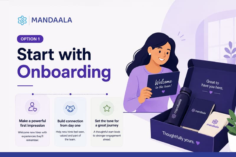 Woman holding a welcome note next to an onboarding gift box.