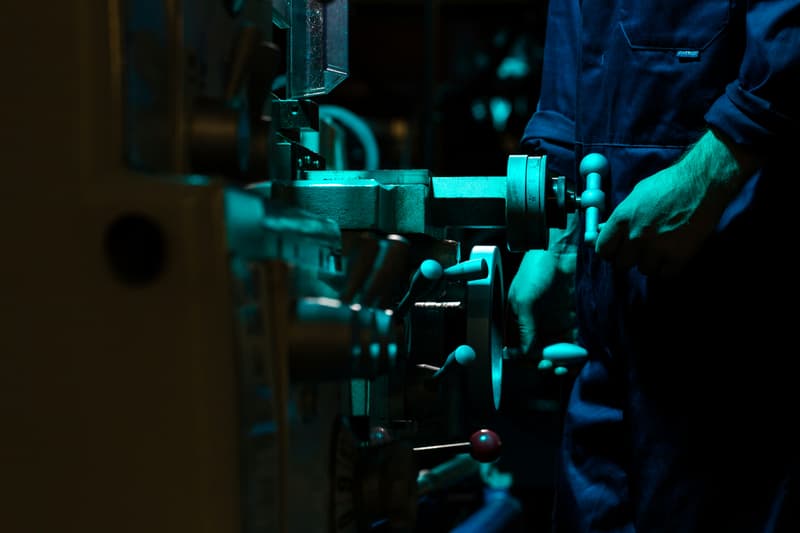 Maintenance engineer performing scheduled service on industrial equipment