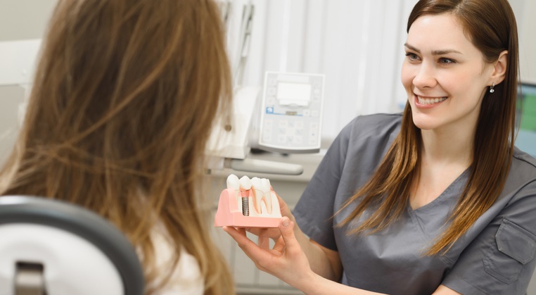 Dental Bridge vs. Implant: Choosing the Right Tooth Replacement Option