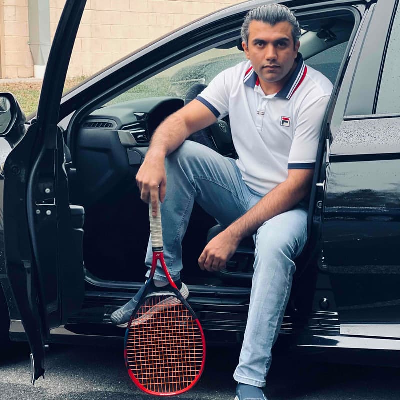 Manny Yawar - tennis coach in Alexandria
