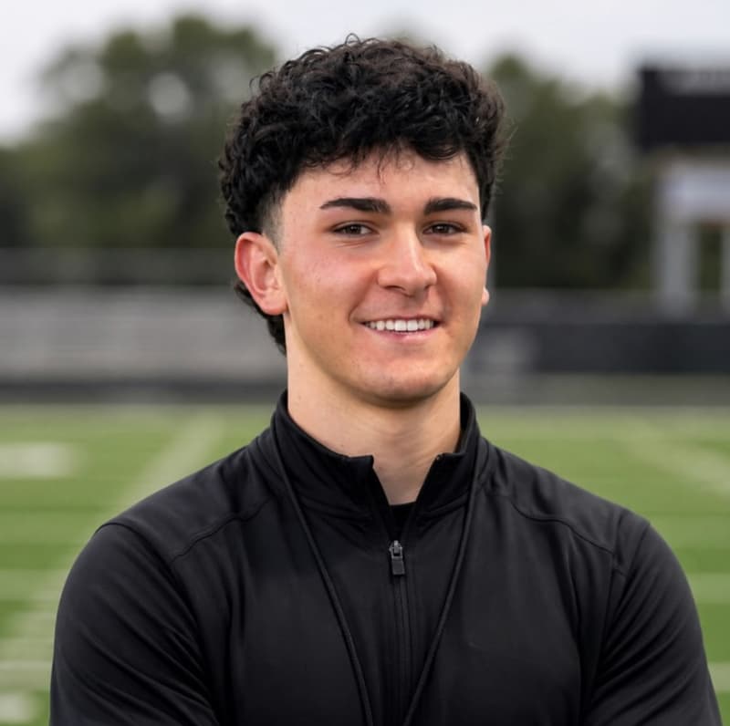 Charlie Hanson - football coach in Leander