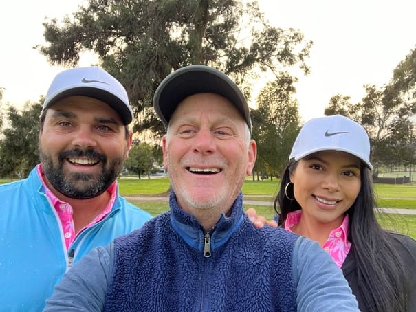 Mitch Saltzman (center) with two coaching students