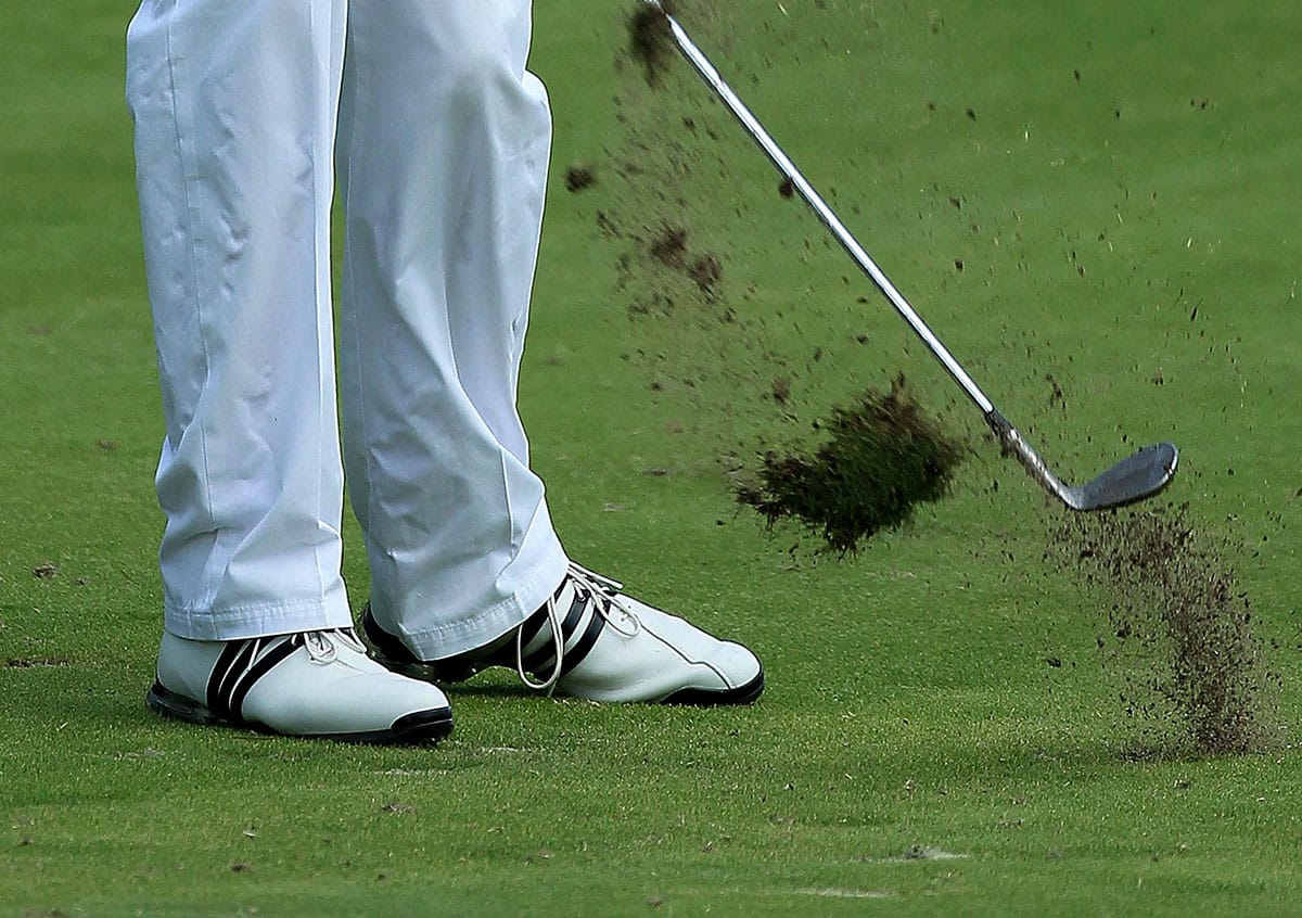 Should I take a divot with my irons? Is it bad if I don't? - Backswing.com