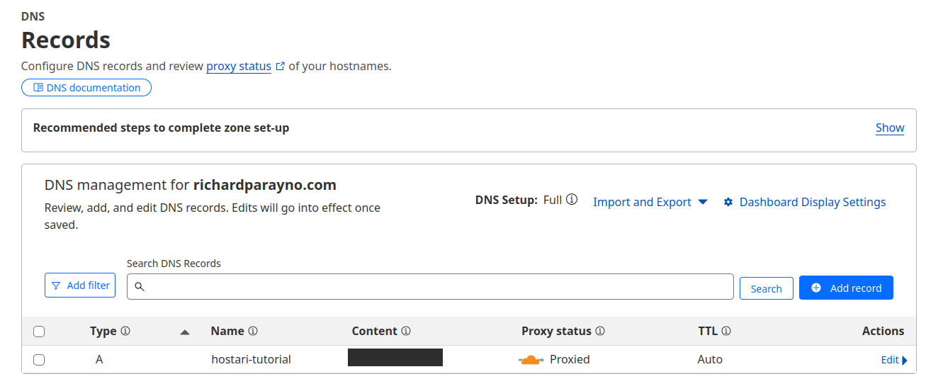 In your DNS settings, you need to create a record pointing your domain to your VPS IP Address.