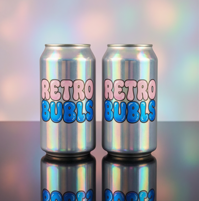 Two beverage cans with retro bubble typography and an iridescent finish on a dark reflective surface