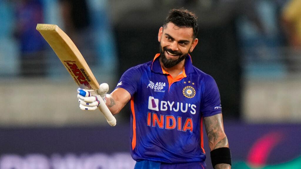 Virat Kohli celebrates his maiden T20I century [Image- AP]