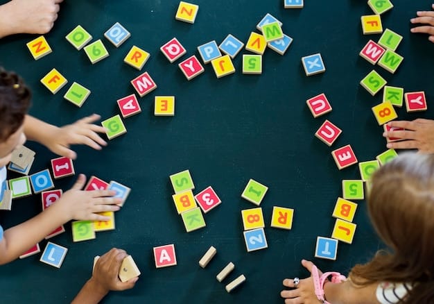Photo kids spelling out words with alphabet blocks