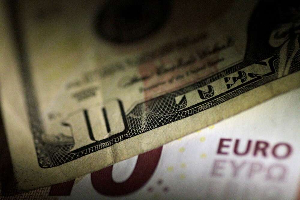 Dollar edges higher as market awaits clues from U.S. Fed