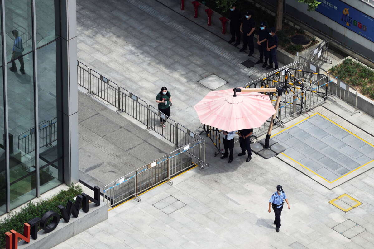 Investors brace for rough ride as Evergrande faces payment deadline