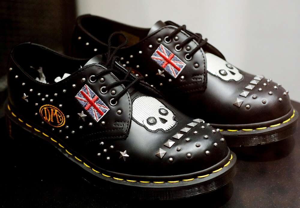 Bootmaker Dr Martens warns on profit as finance chief walks