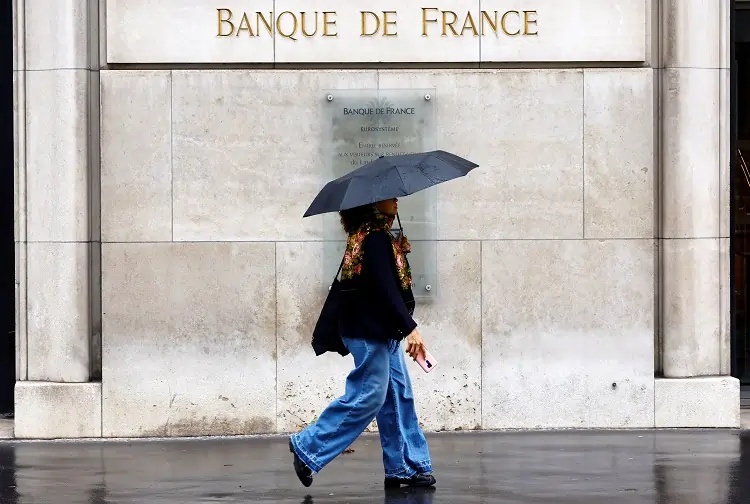 French central bank trims growth outlook on political drama