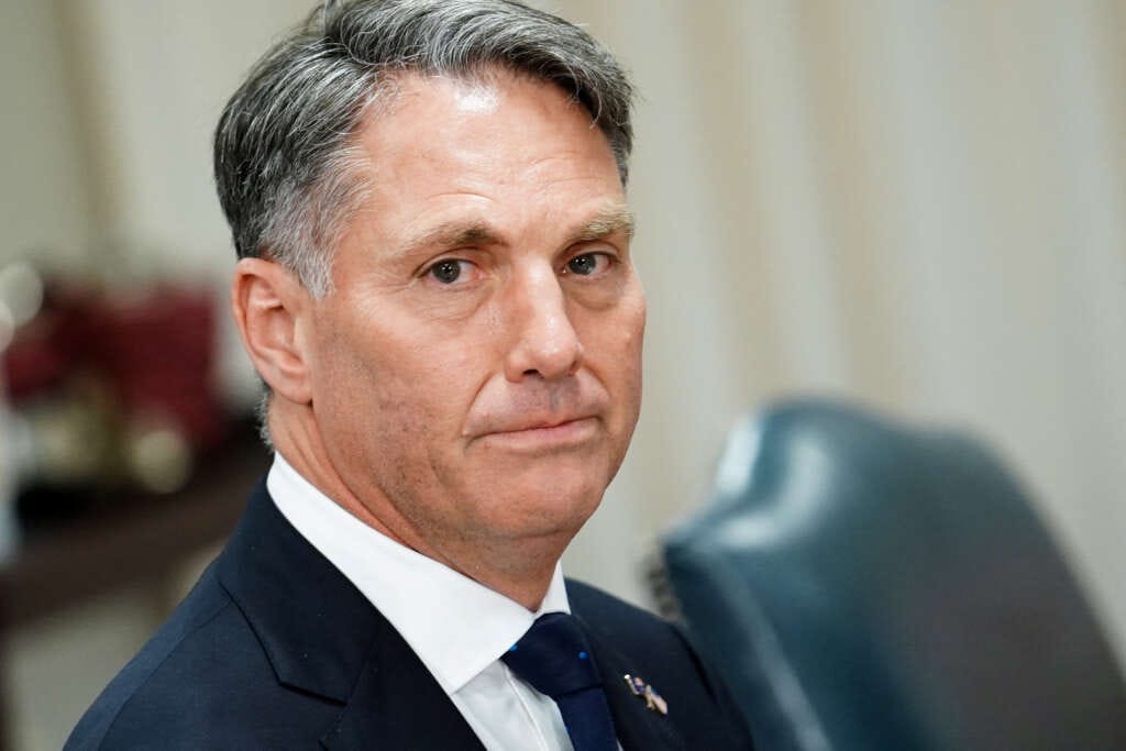 Australia to investigate reports pilots trained Chinese military – minister