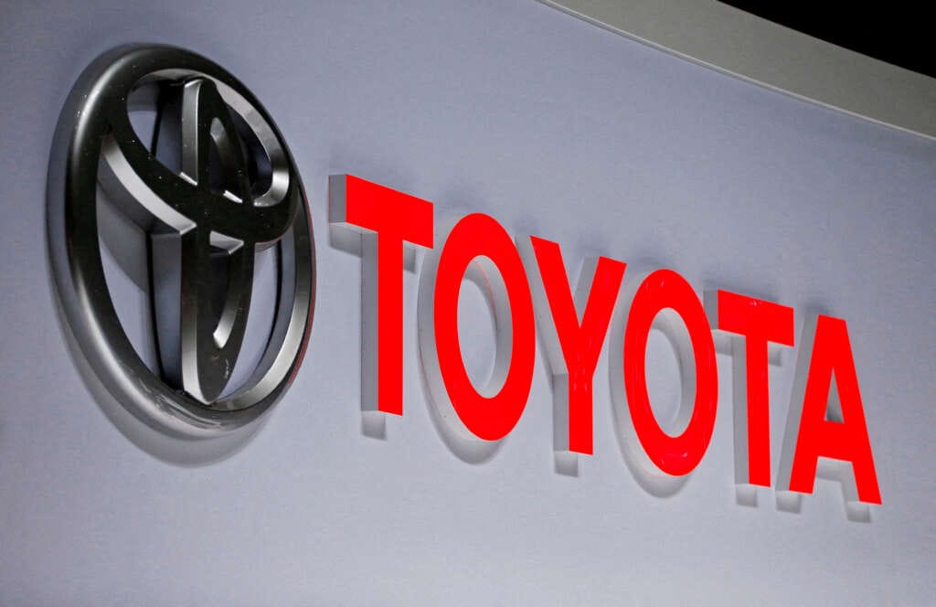 Toyota cuts output target amid chip crunch as profit tumbles 25%