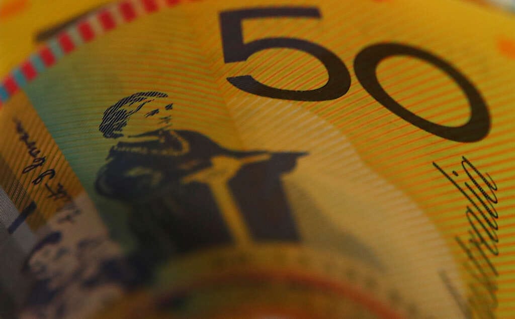 Aussie dollar firm as bonds tumble, yen looks past BOJ