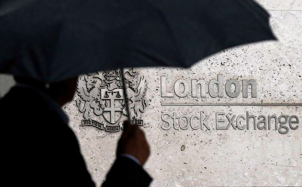 FTSE 100 rebounds on energy, earnings lift