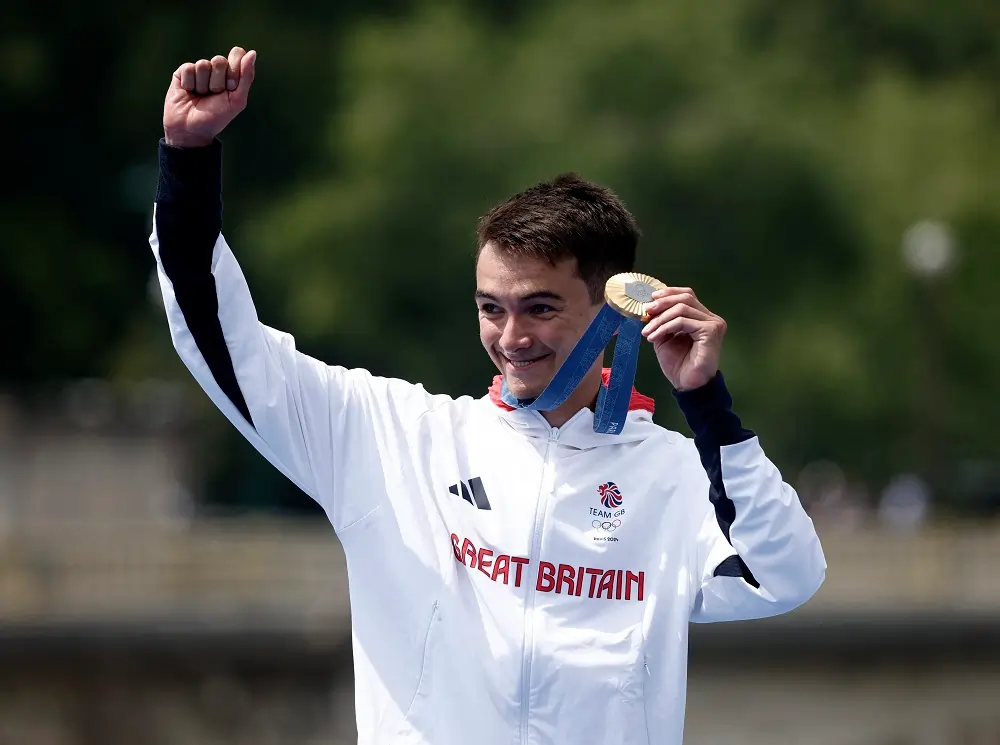 Olympics-Triathlon-France and Britain victorious in thrilling Paris races