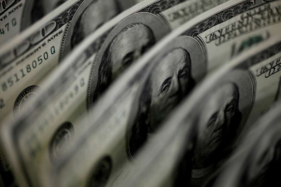 Dollar advances as strong U.S. data backs higher rates backdrop
