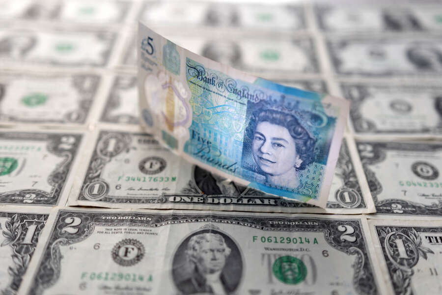 Sterling hovers just below 10-month high, with focus on U.S. job numbers