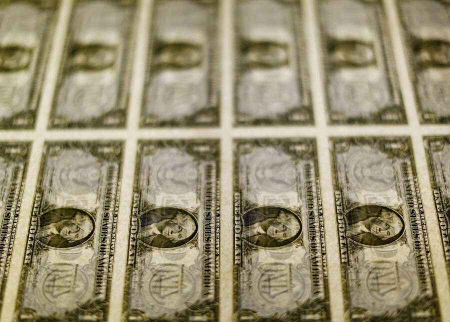 Dollar heads for first weekly gain since February
