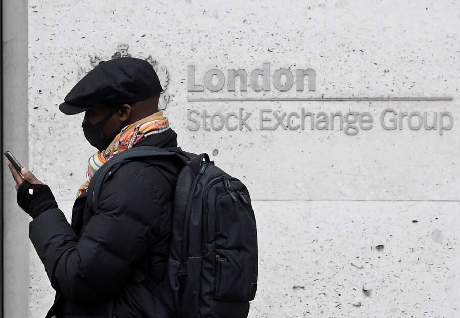 FTSE 100 muted as strong earnings offset by losses in commodity stocks