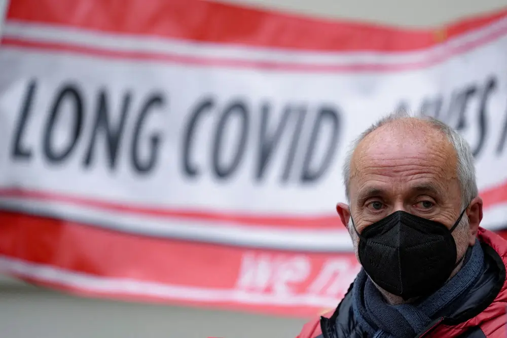 Two million Britons suffer long COVID symptoms, survey shows