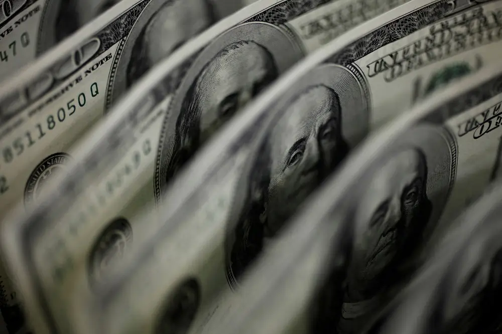 Dollar weaker on renewed Fed rate cut hopes; yen wobbles