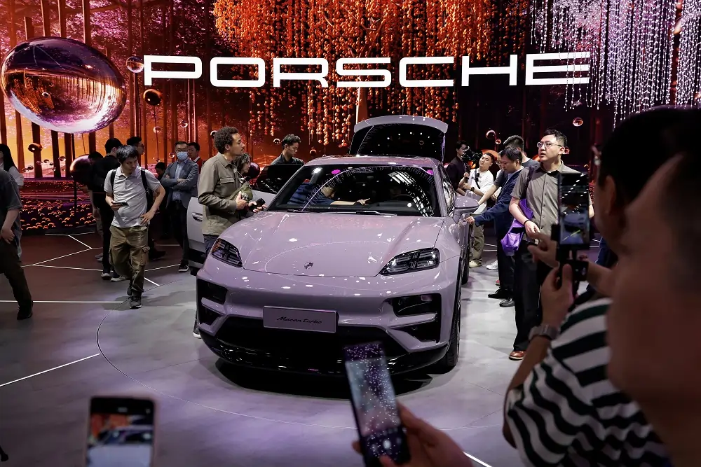 Porsche cuts forecasts due to alloy shortage, shares fall