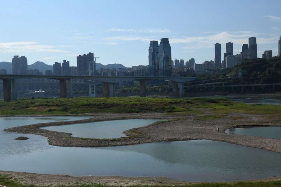 Yangtze tributary runs dry as China faces another month of drought