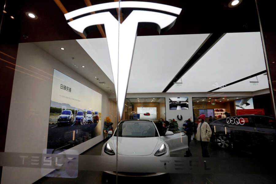 Tesla posts record quarterly deliveries after price cuts, up 4% from Q4