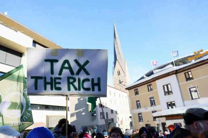As Davos crowd gathers, governments urged to rein in ‘billionaire class’