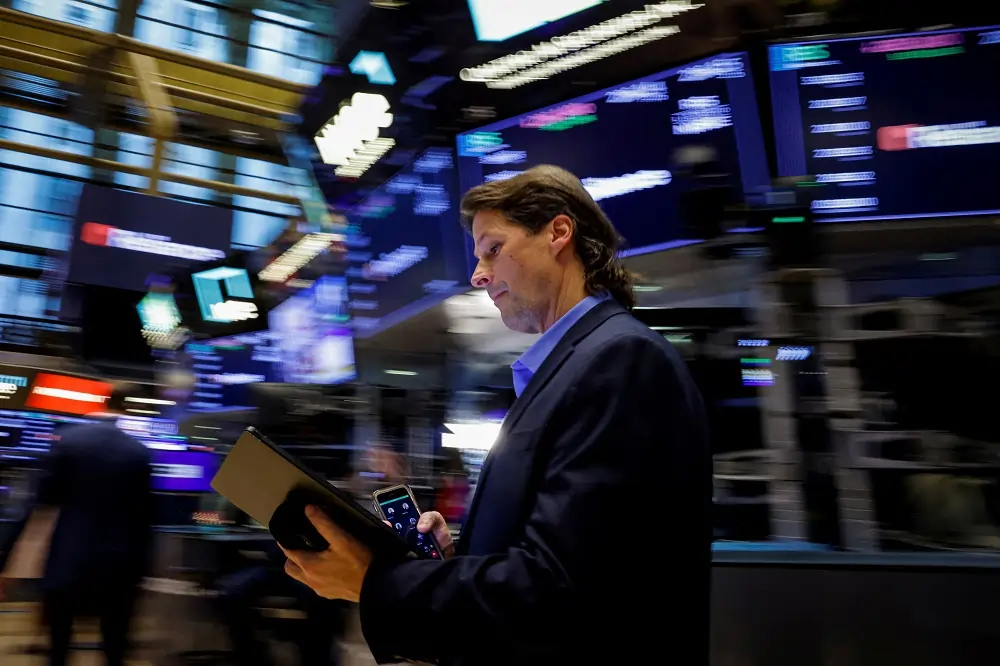Stocks lose ground, oil extends gains amid Middle East tension