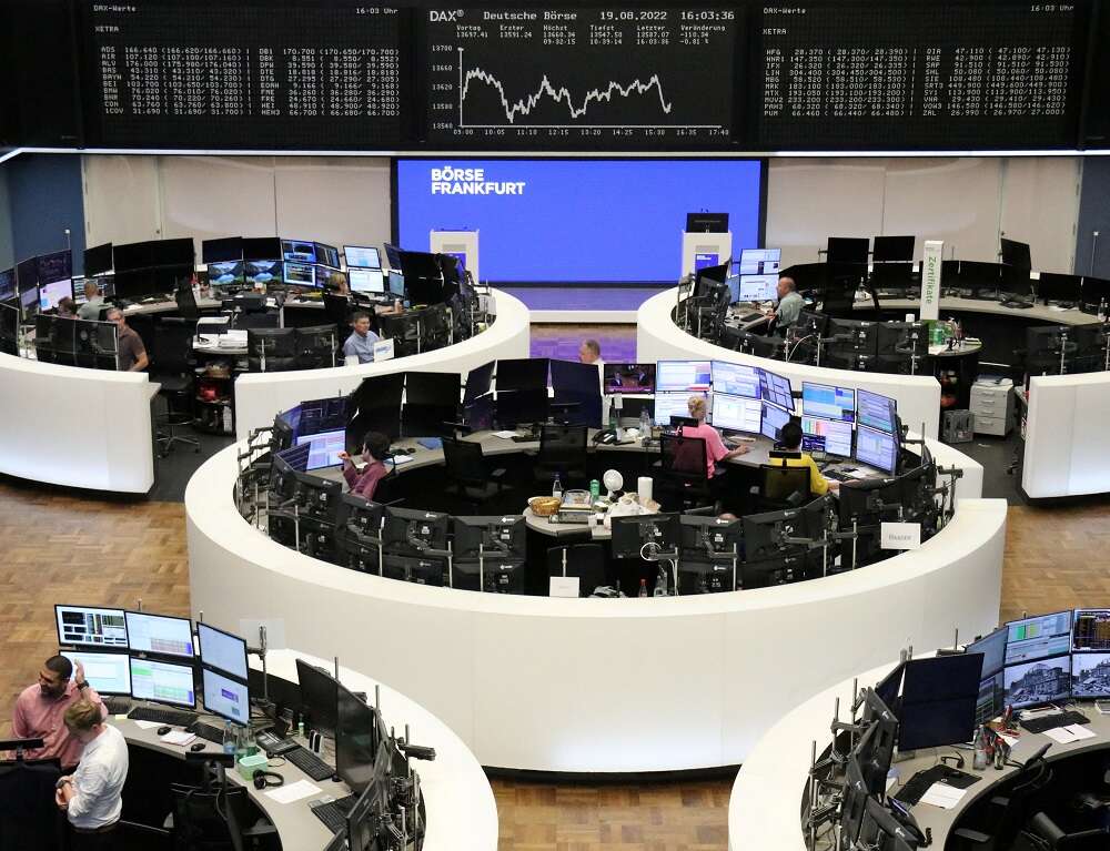 European bourses flat as defensive stocks offset growth fears