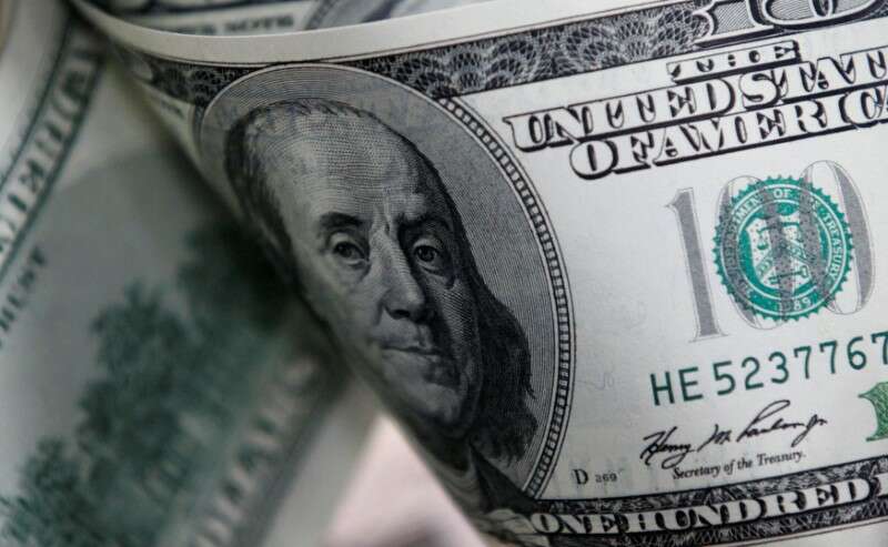 Dollar moves off lows on heels of inflation data