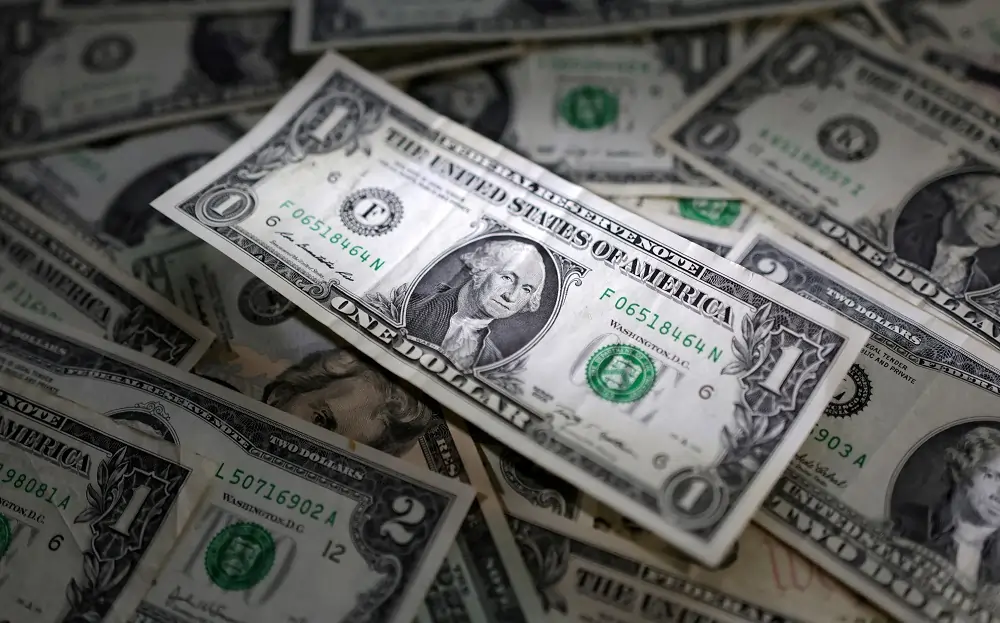 Dollar dips before Fed meeting statement