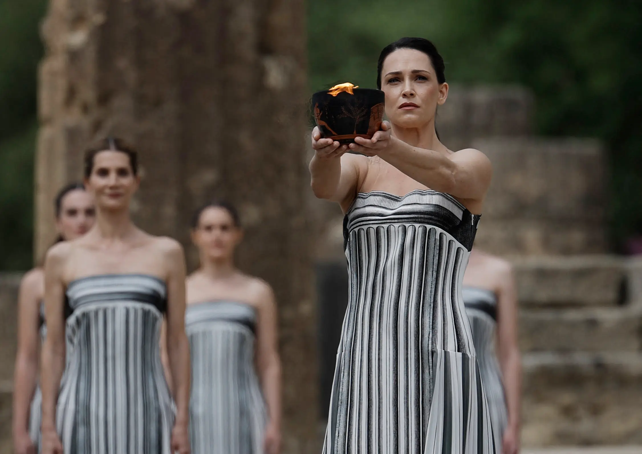 Olympics-Paris 2024 torch lit in ancient Olympia, relay under way