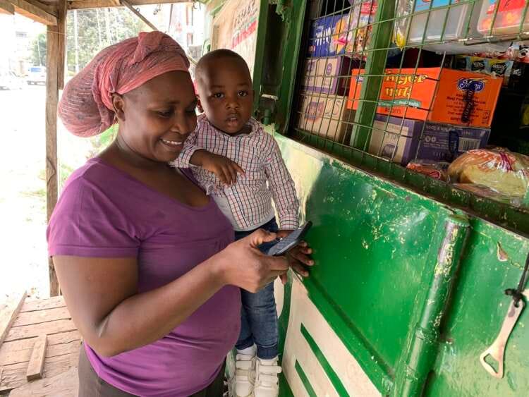 FEATURE-Africa’s mobile money taxes risk driving poor out of digital economy
