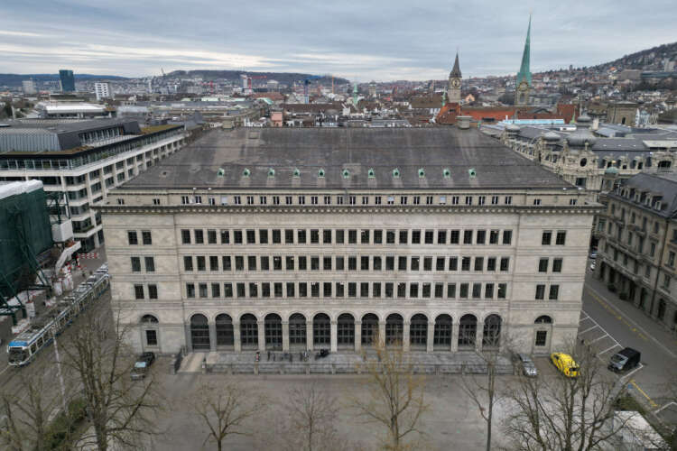 Swiss National Bank raises rates, says bank crisis stopped