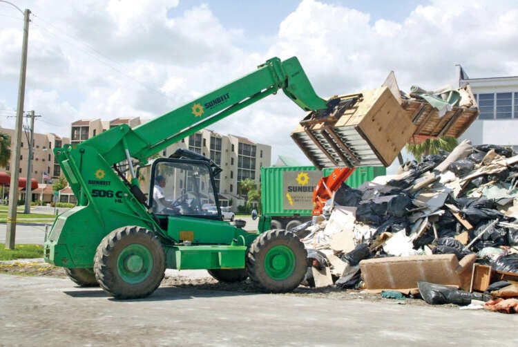 Equipment rental firm Ashtead lowers UK rental revenue outlook, shares fall