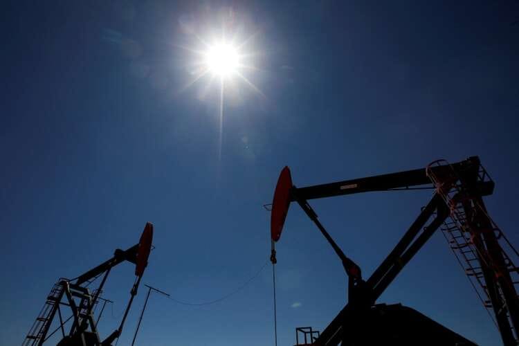 Oil pares gains ahead of Fed Reserve comments