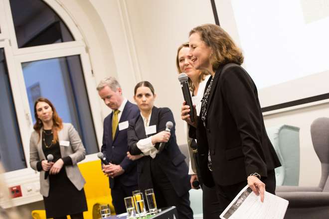 Marcia Mueller speaking at the event
