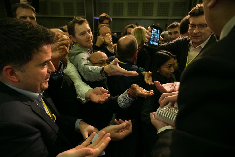 The mad rush overwhelmed Lee, who was forced to hand them out randomly to the excited mob regardless of downloads. 