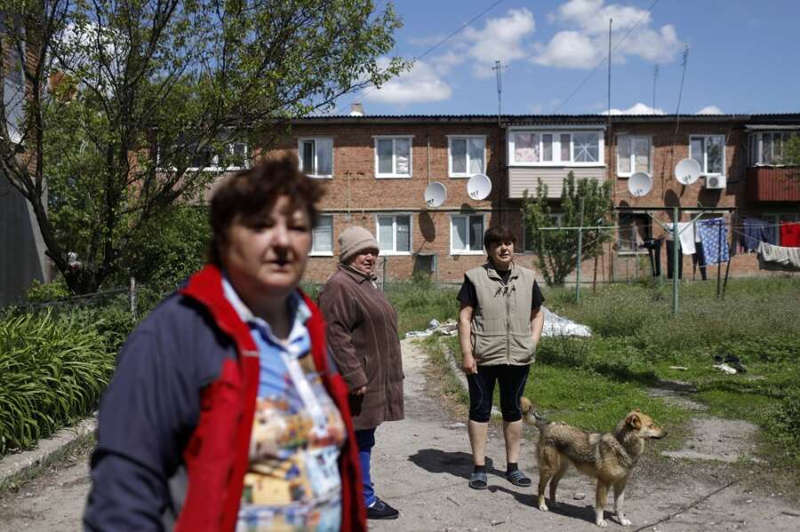 Ukraine apartment residents suffer war in different ways