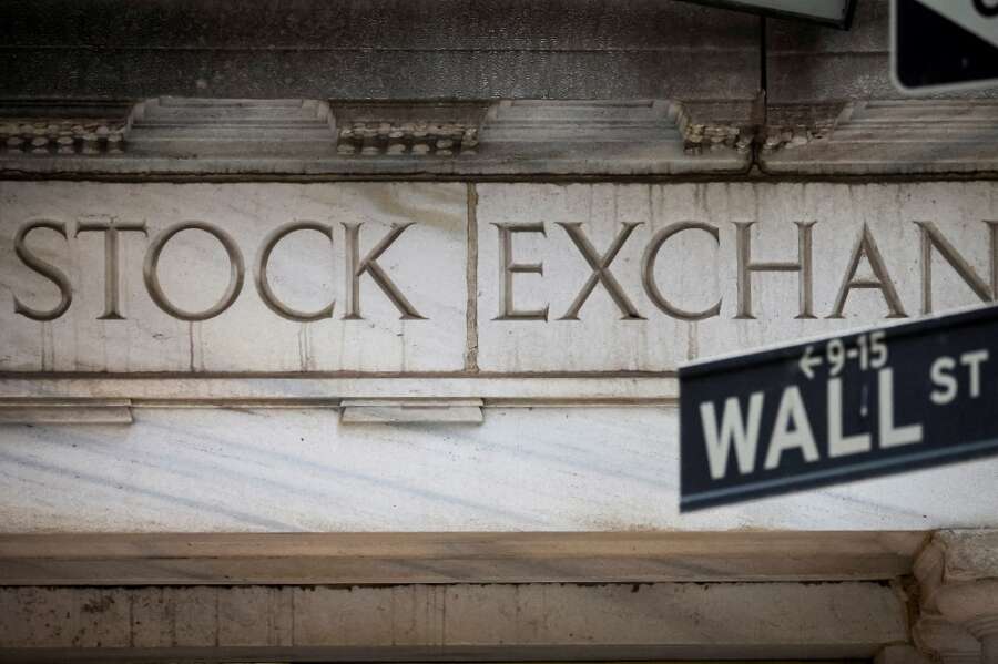 Wall St stocks fall, bond yields rise as China drops quarantine rule