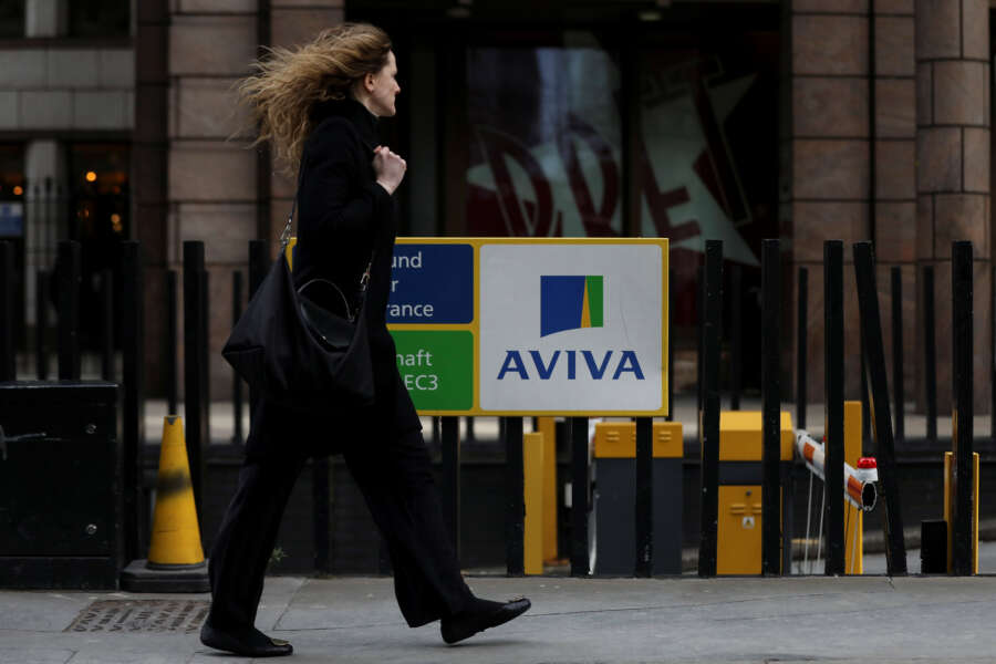 Aviva boosts investor payouts after profit beat