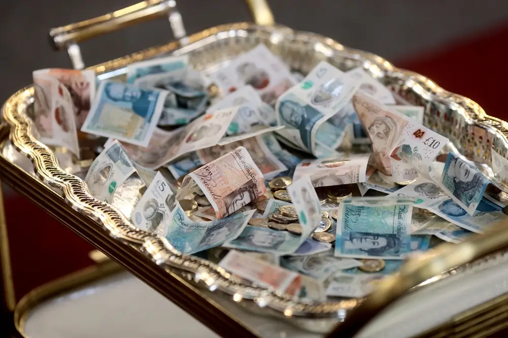 Sterling dented by one-two punch from dollar and euro