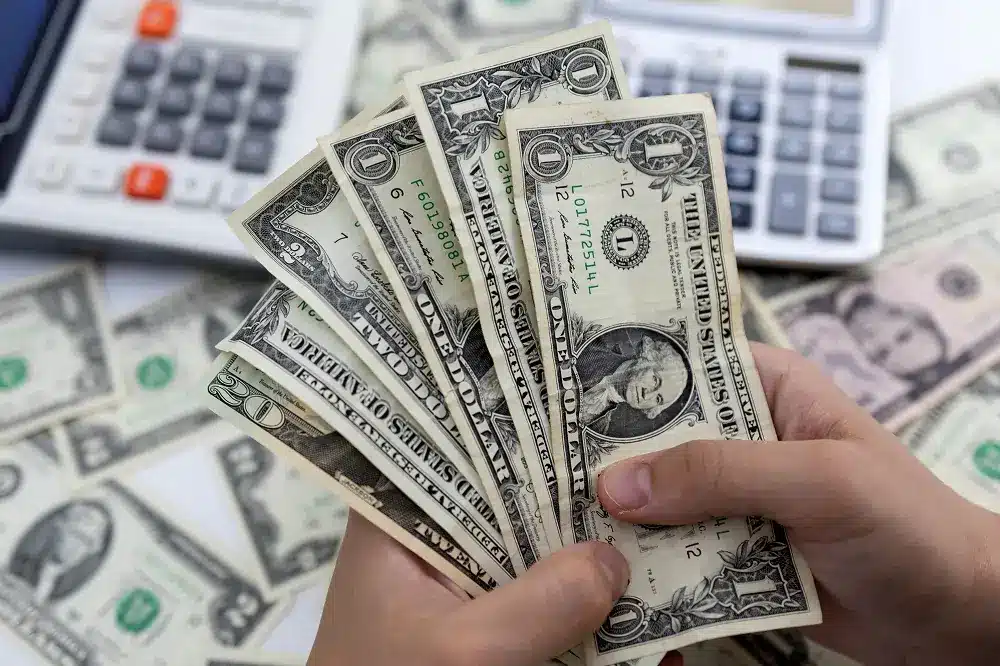 Dollar drops, yen surges as consumer prices fall in June