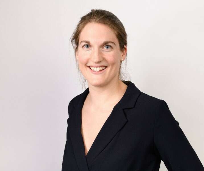 a woman in a black suit