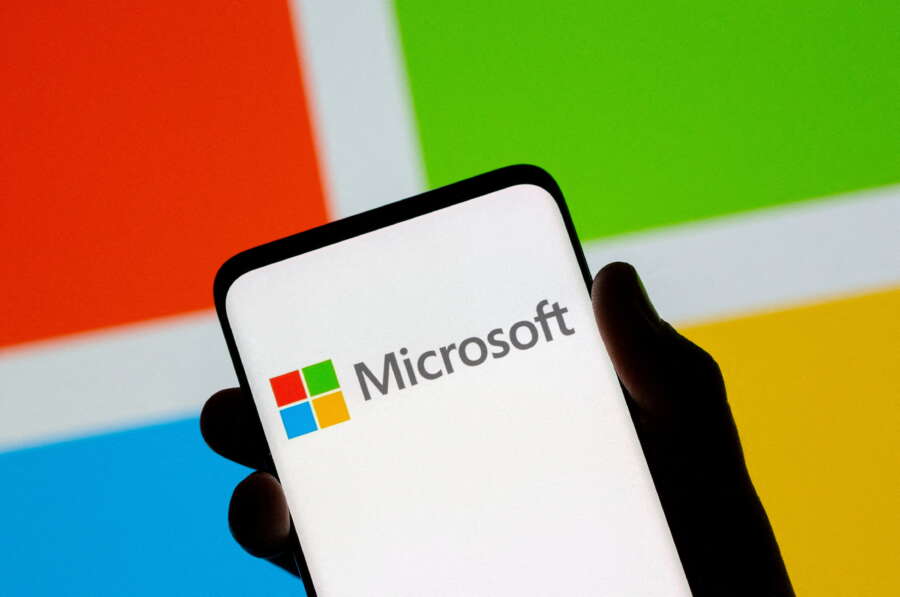 Microsoft offers strong forecast, lifting shares