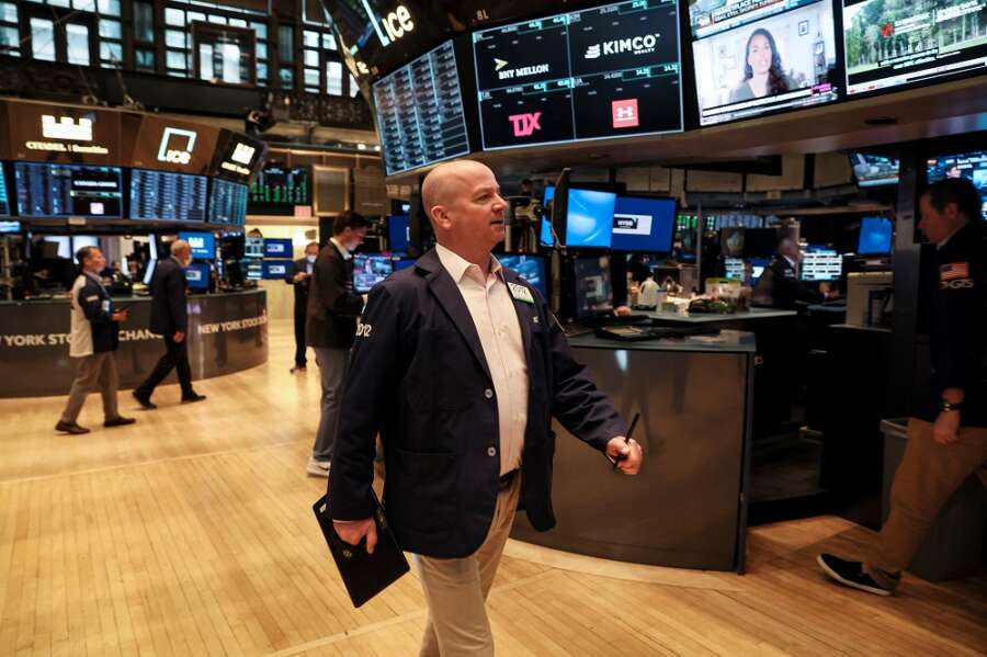 Stocks slide on growth fears, oil tumbles